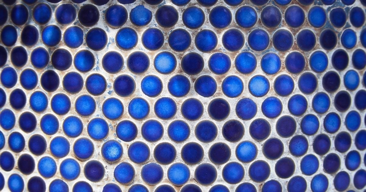 Add Texture and Character to Your Shower with Penny Tiles 
