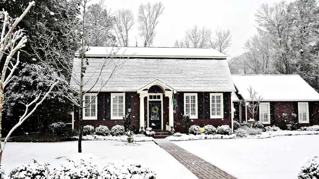 Saltbox Home With Snow