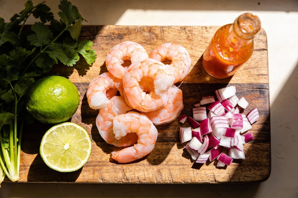 Preparing the shrimp broth for an Authentic Mexican Coctel de Camarones