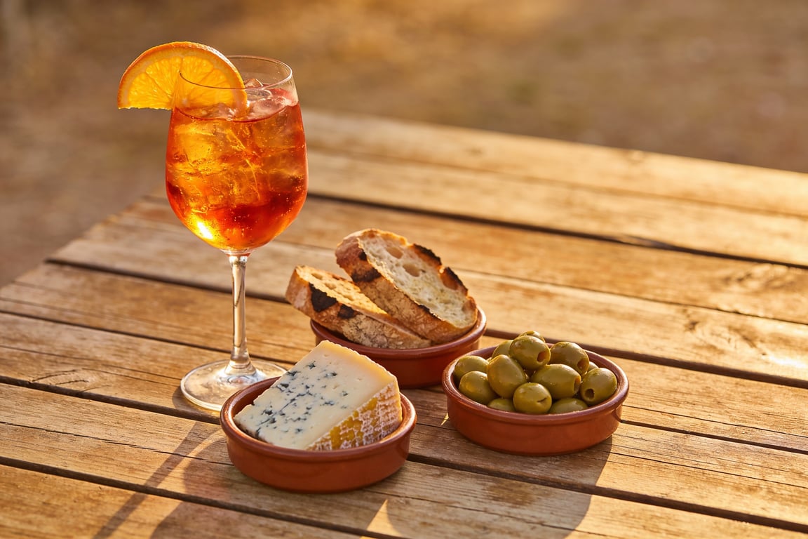 Aperitivo culture lifestyle shot with a completed 3-2-1 Aperol Spritz