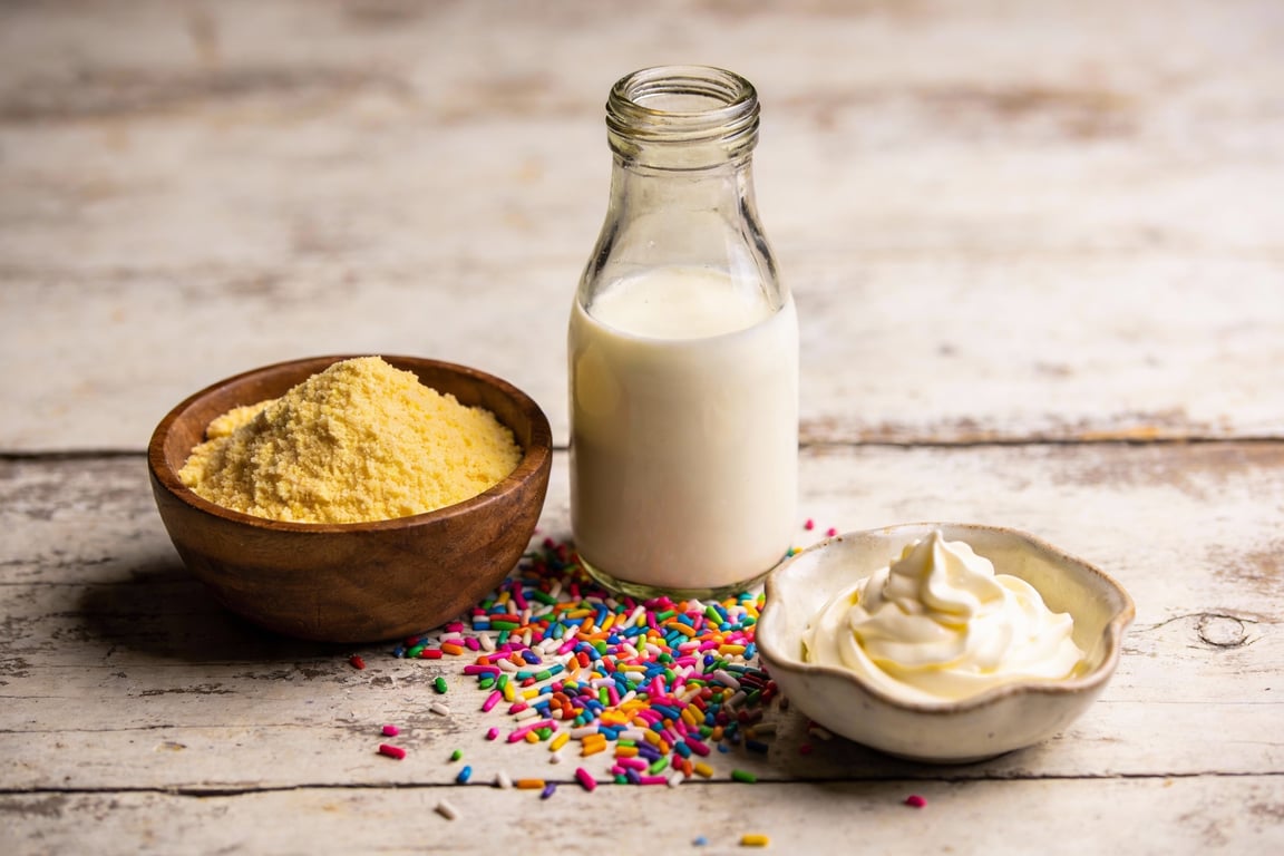 A rainbow sprinkle drink rim for a birthday cake drink