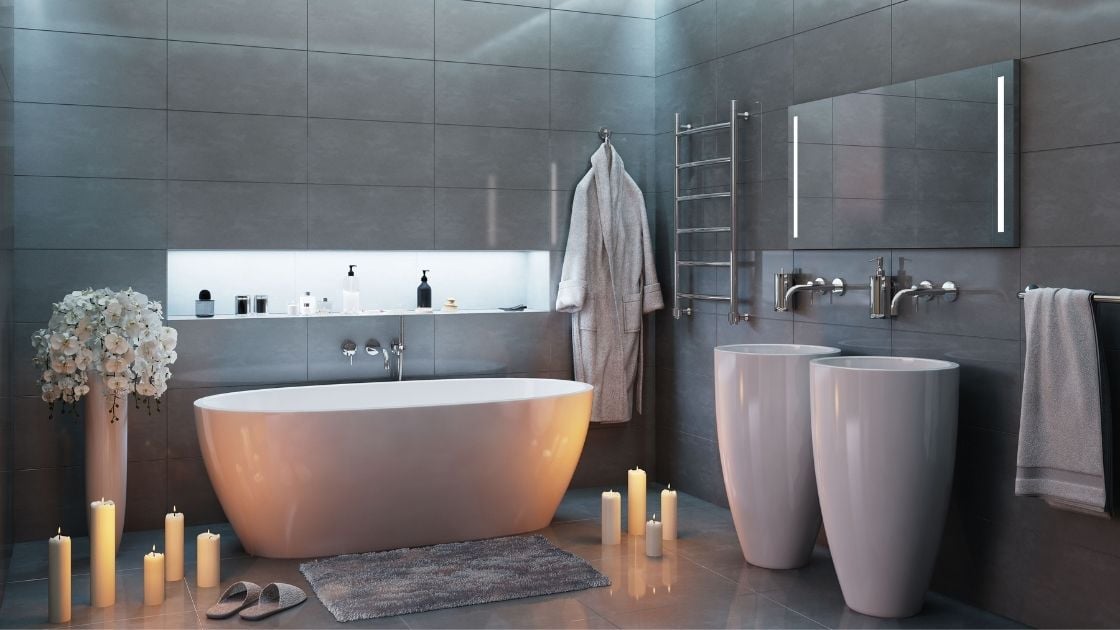 Gray Bathroom With White Vanity and Tub