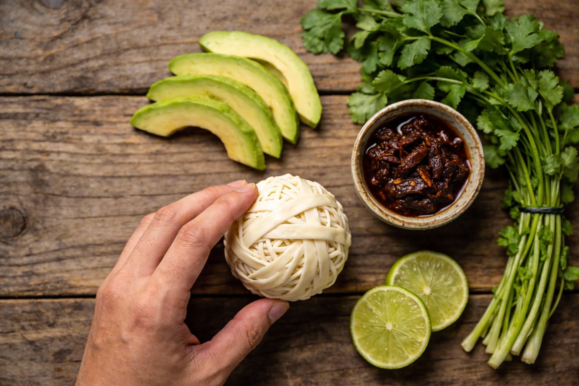 Shredding cheese for the Mexican Tuna Melt