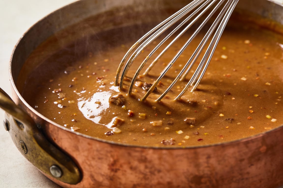 Simmering ingredients for a classic giblet gravy recipe