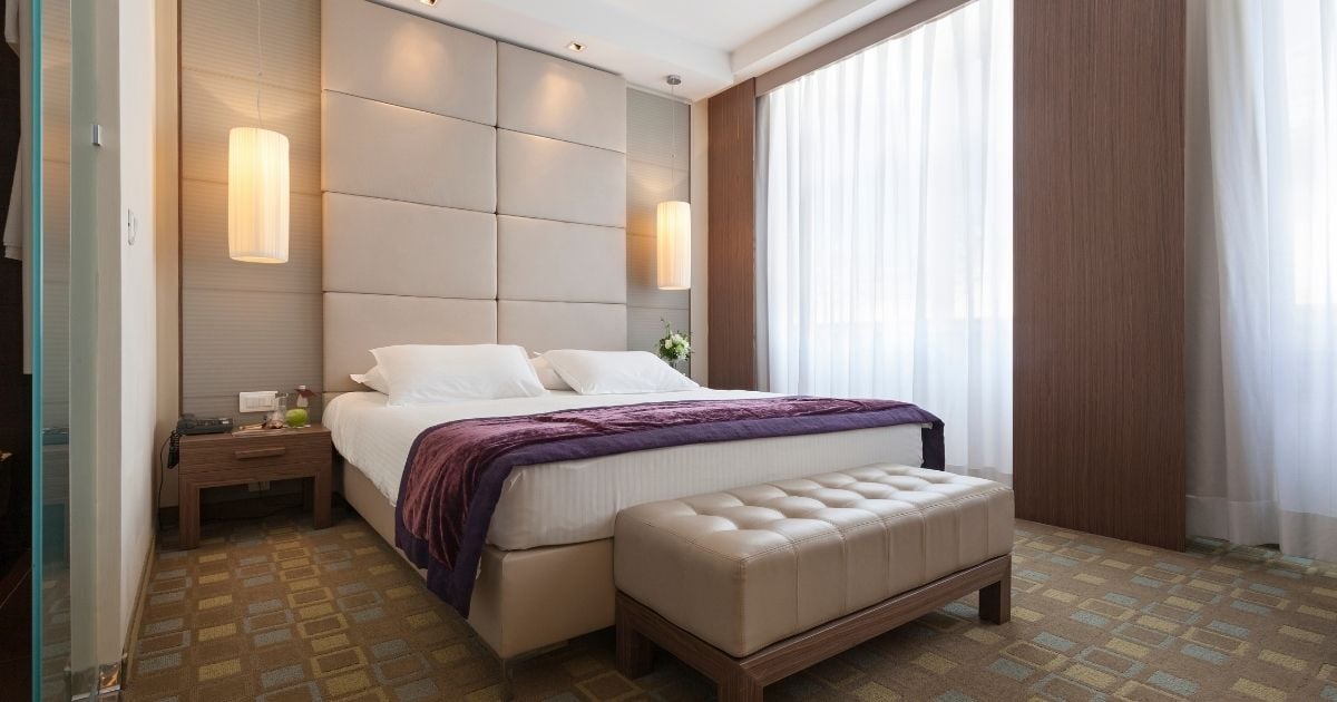 Keep your bedroom looking tidy with a storage bench