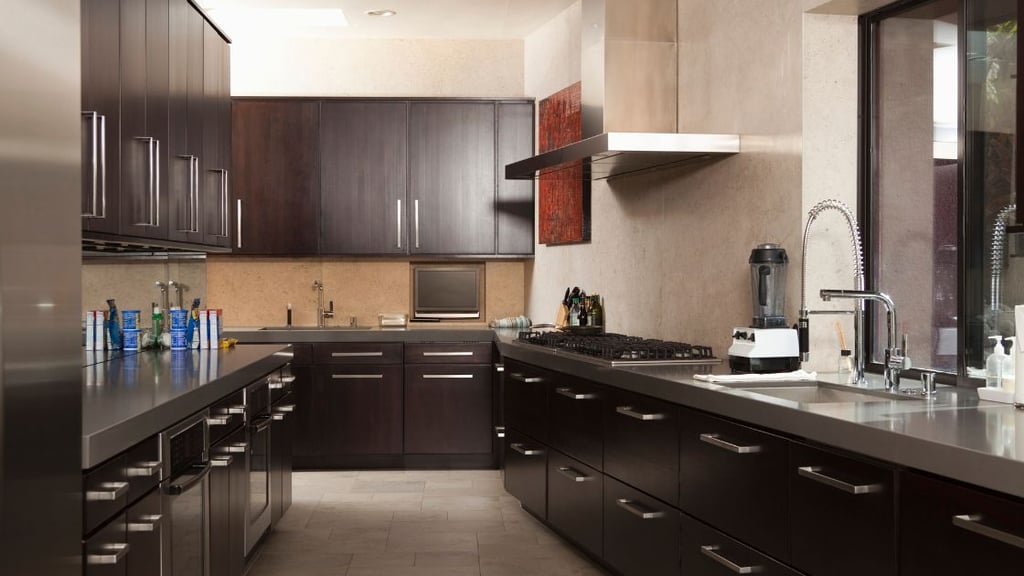 Kitchen with dark countertops