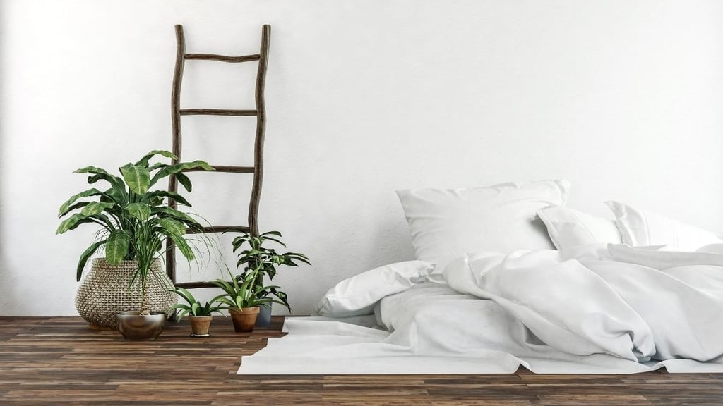 Our final room is perhaps the simplest.  The dark wooden floor contrast with the white walls and white linens.  
