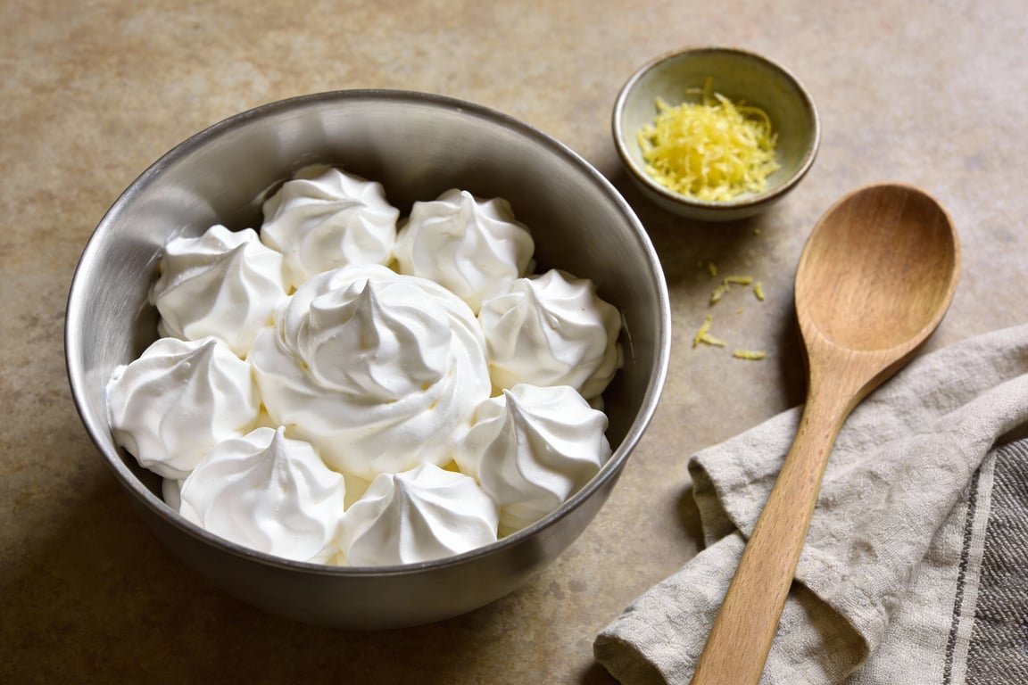 Aquafaba meringue tips showing stiff glossy peaks