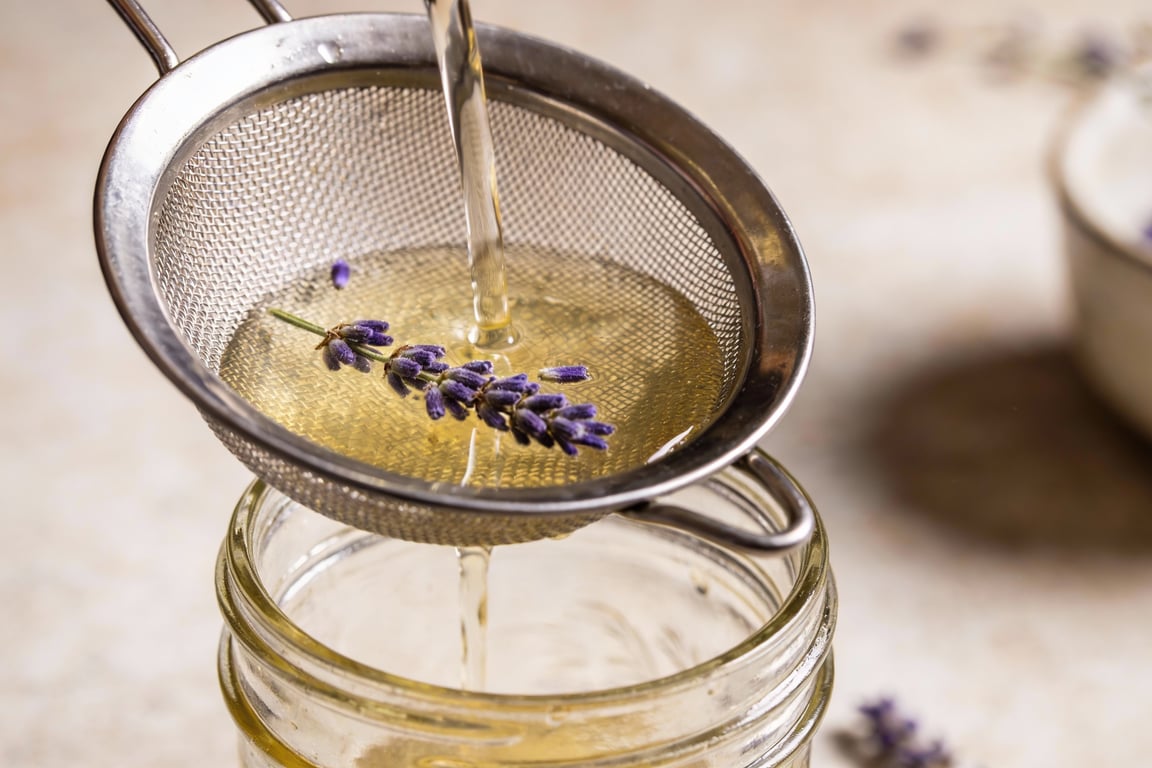 Simmering homemade lavender syrup for the punch