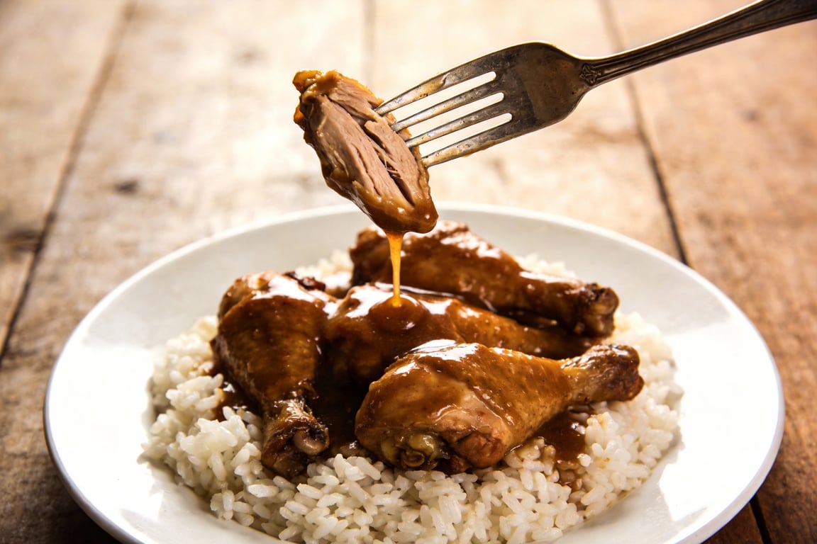 Whisking the slow roasted turkey wings gravy