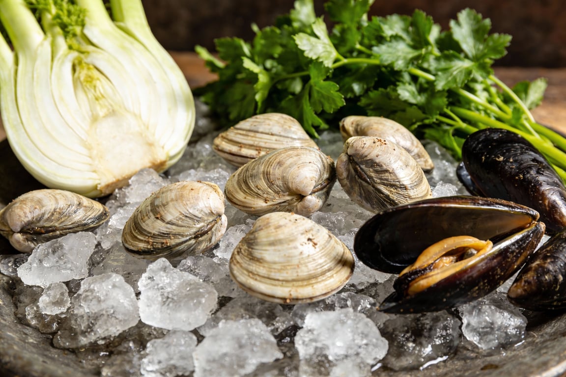 A simmering pot of San Francisco Cioppino with Dungeness crab and clams