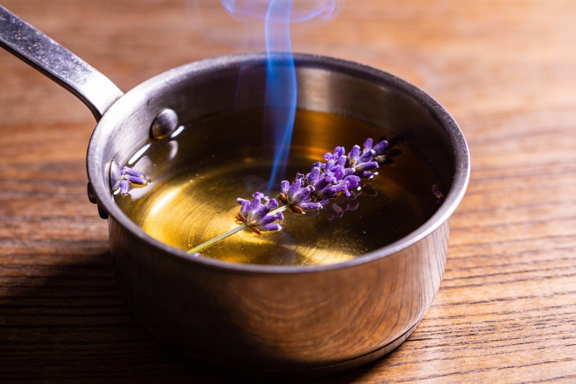 A finished glass of Smoked Lavender Grilled Lemonade served over ice