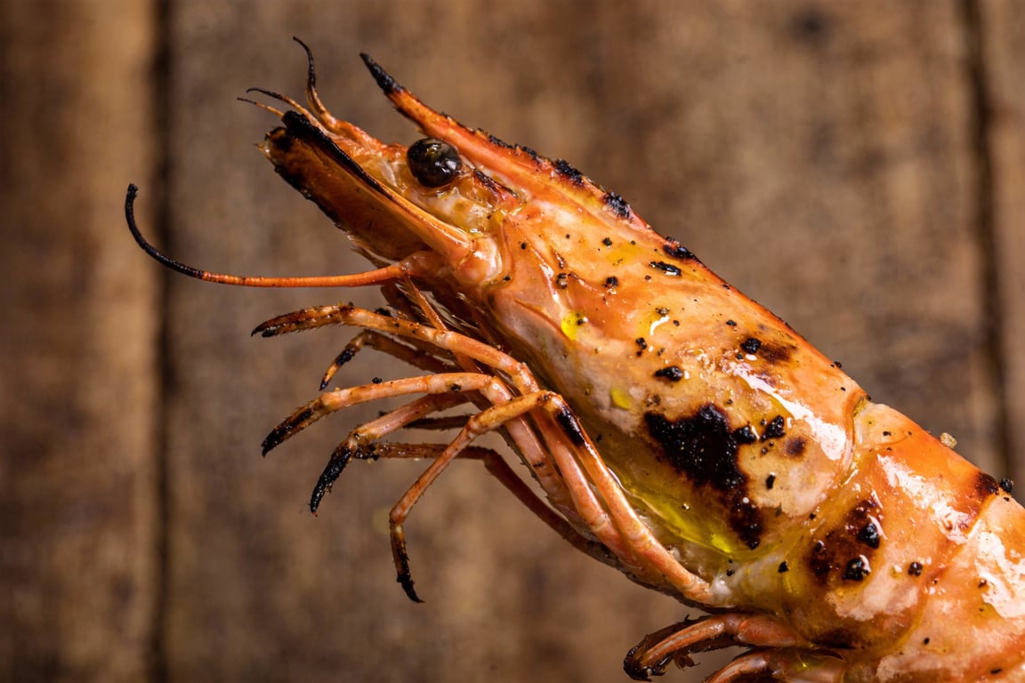 Grilling prawns for a charcoal grilled shrimp cocktail