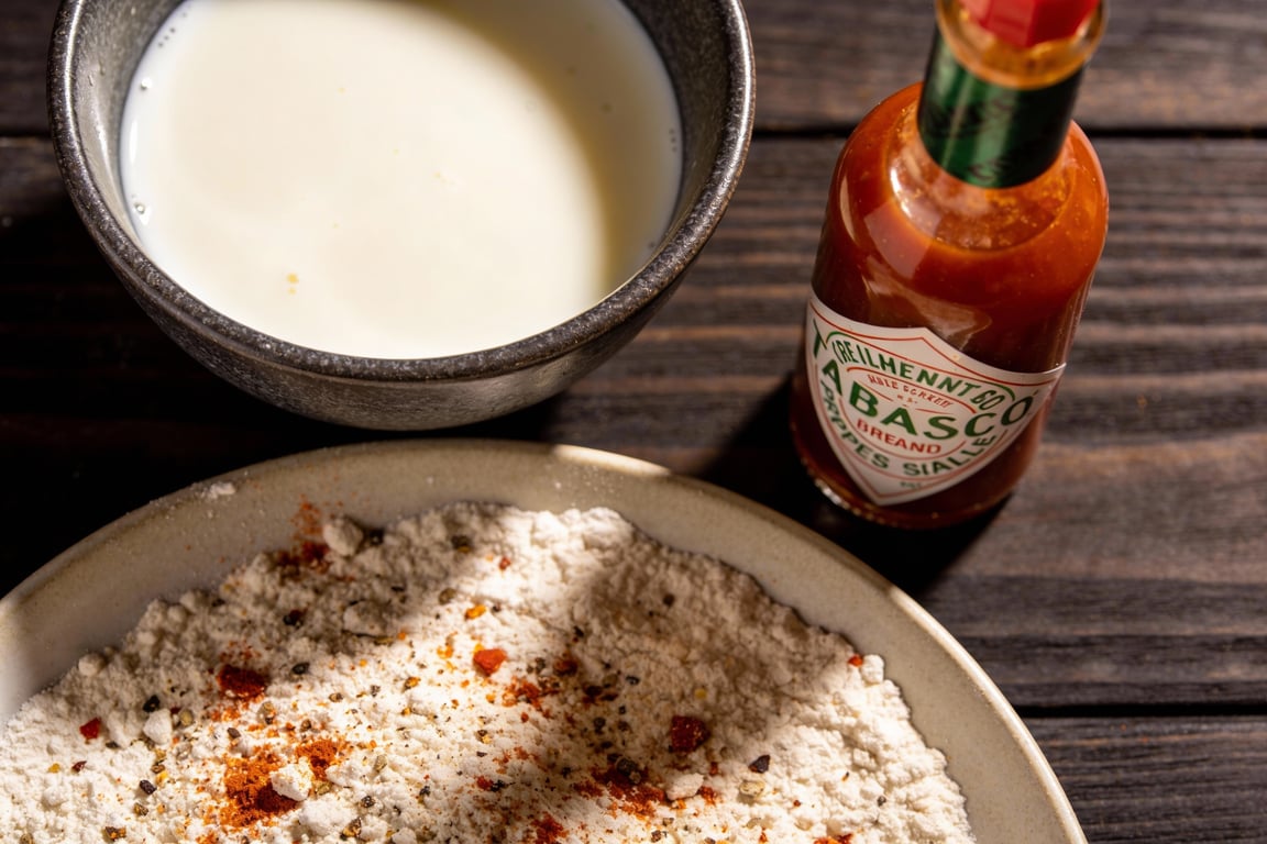 Coating Southern-Fried Veal Chops in seasoned flour