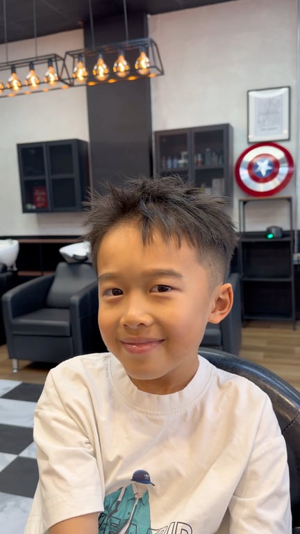 Fresh haircut with textured top and clean sides.