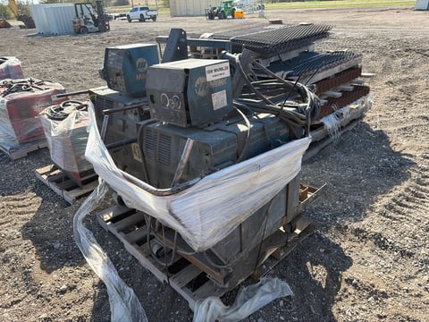 (2) Miller CP-302 CV/DC Mig Welders w/ Wire Feeders on Cart — photo 1