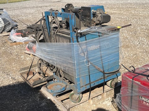 (2) Miller CP-302 CV/DC Mig Welders w/ Wire Feeders on Cart — photo 3