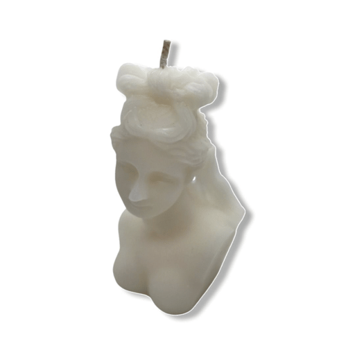 A WOMANS FACE SHAPED CANDLE