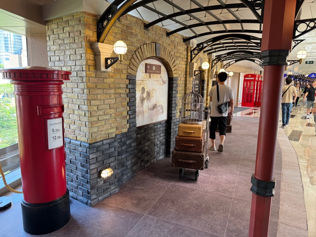 The connector between The Londoner hotel and other nearby hotels features attractions like a post box and Platform 9 3/4.