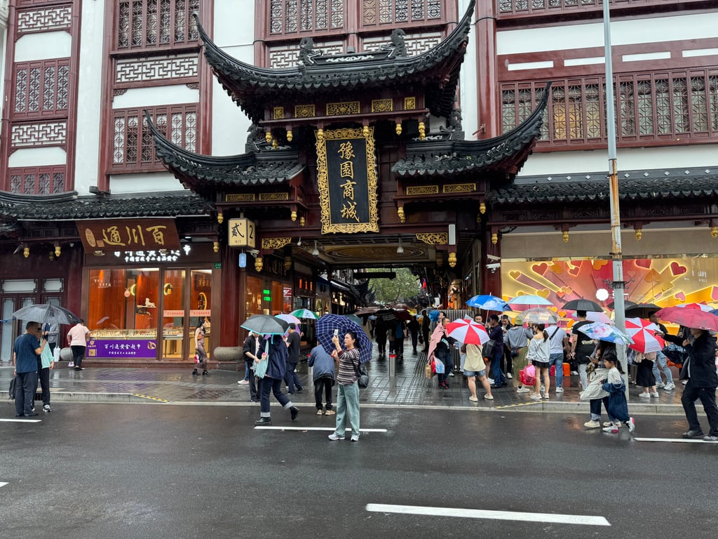 An outdoor shopping complex outside a temple.