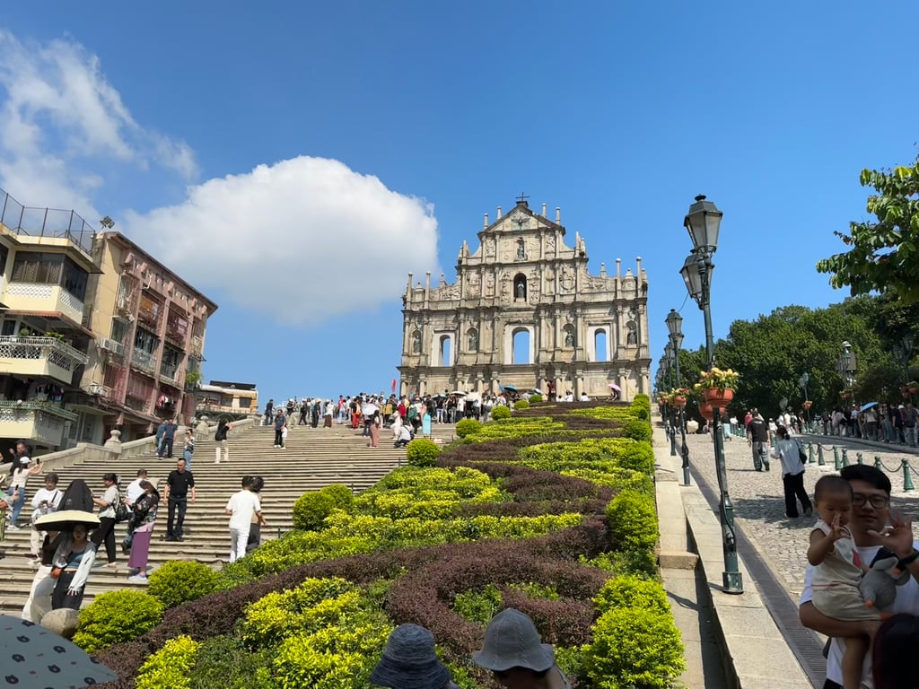 According to Wikipedia, the church was constructed by Japanese Christian craftsment who were converted by Jesuits and expelled from Japan.