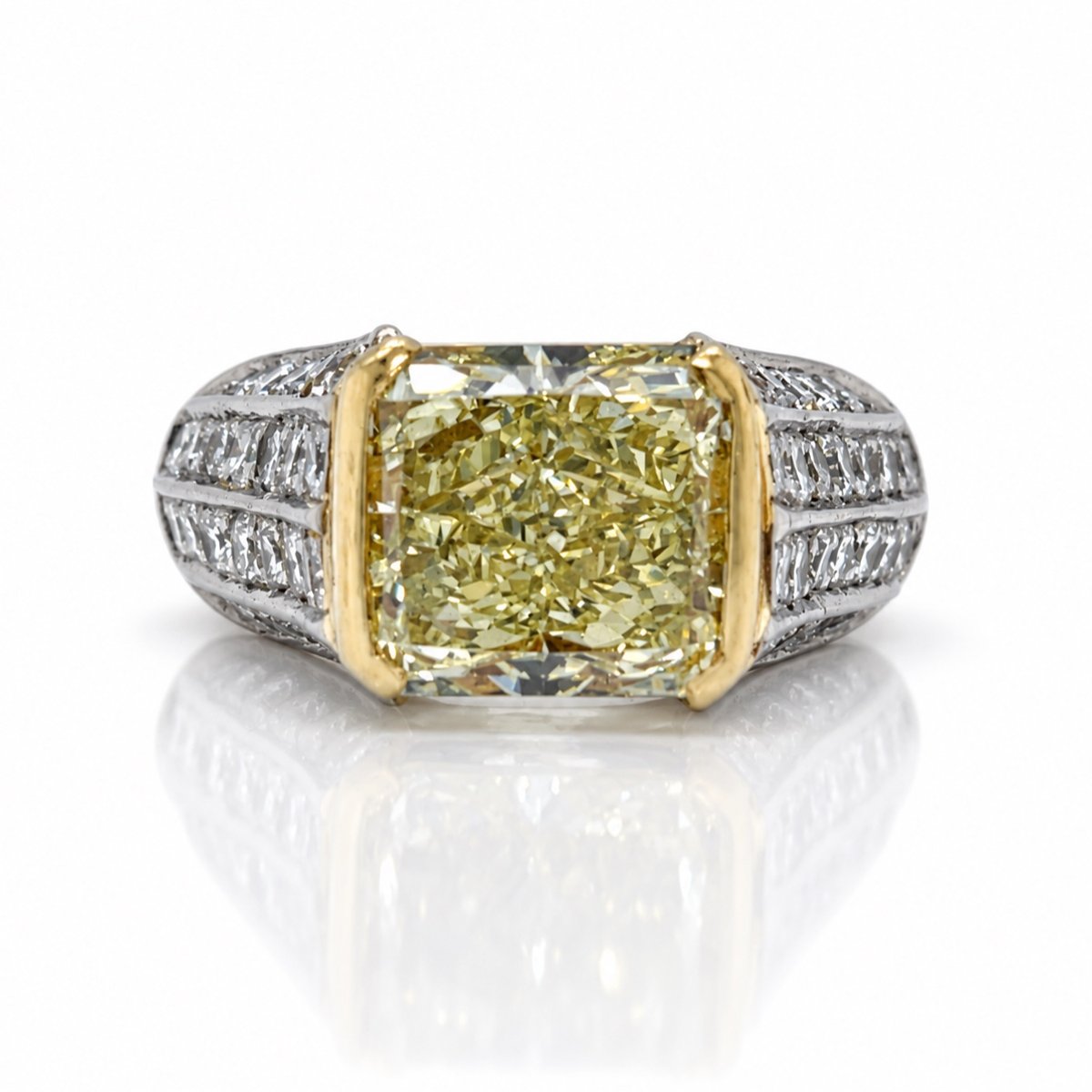 Platinum GIA Certified 5.77 Ct. Fancy Yellow Diamond Ring