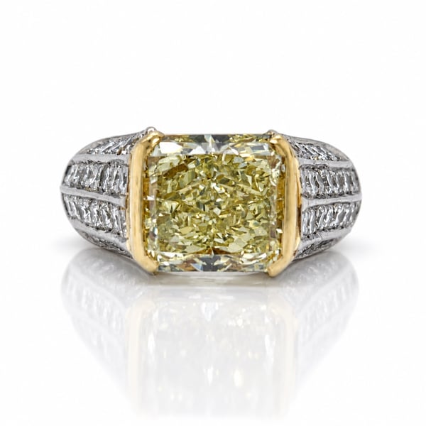 Platinum GIA Certified 5.77 Ct. Fancy Yellow Diamond Ring