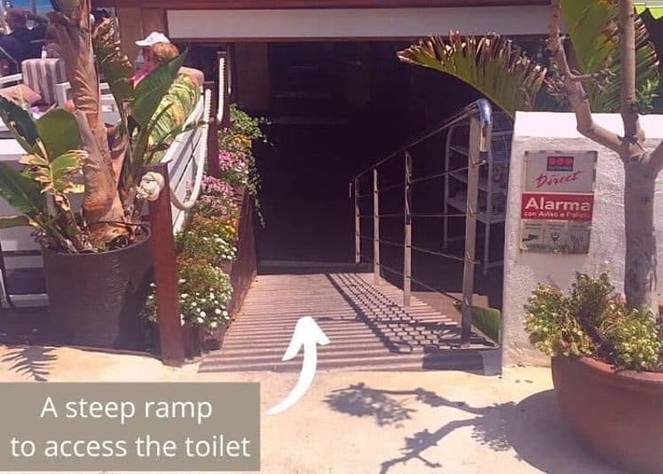 A steep ramp to access the toilet