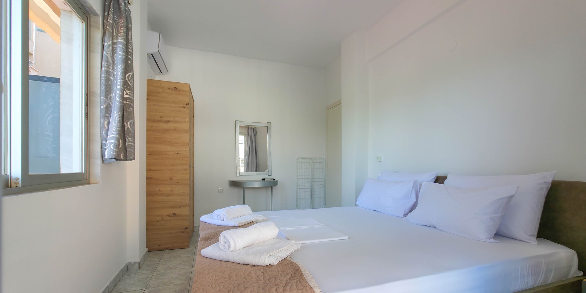 Areti Suites by SDR: Your Spacious Two-Bedroom Office by the Sea