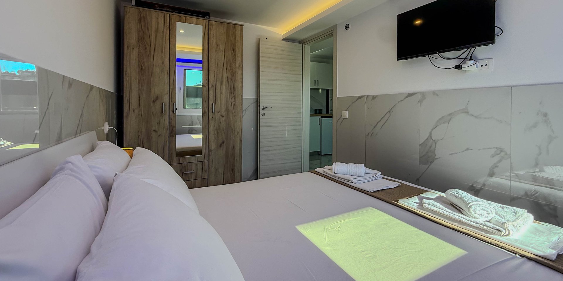 The "Private Oasis" feel, the pool, and family-run hospitality.