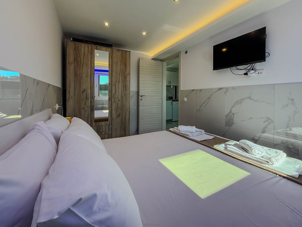 The "Private Oasis" feel, the pool, and family-run hospitality.