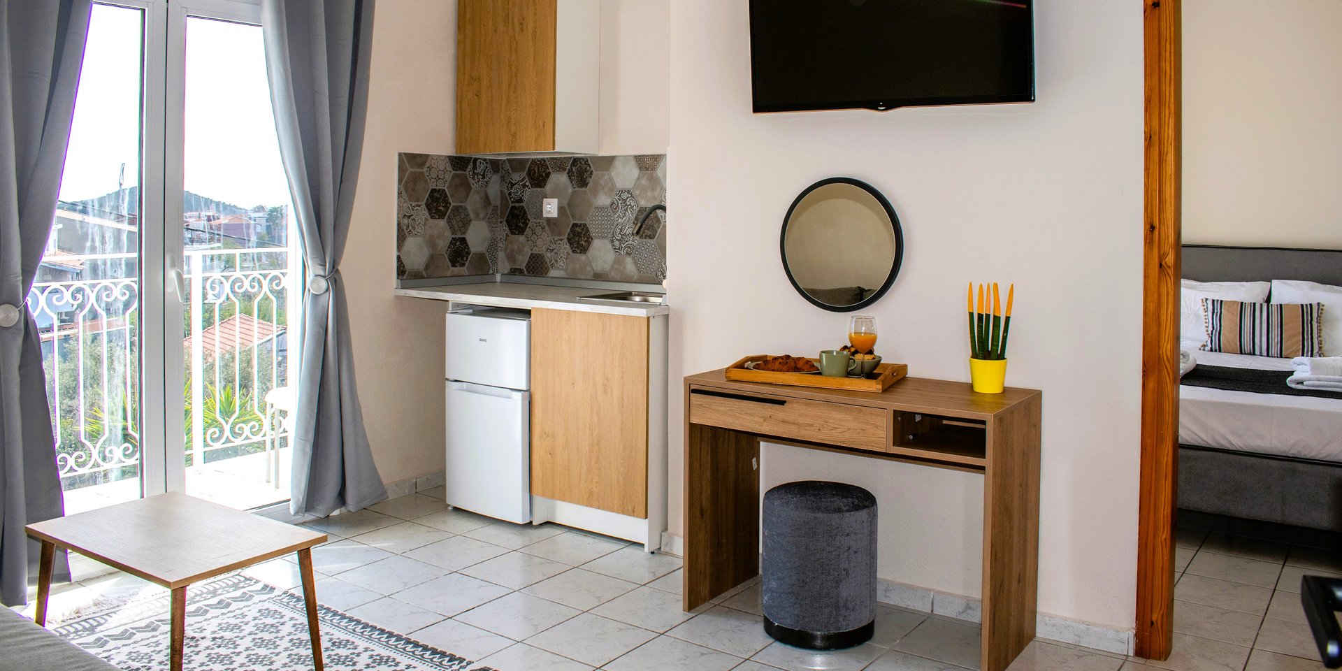 One Bedroom Apartment with kitchenette, Balcony, 2nd Floor.