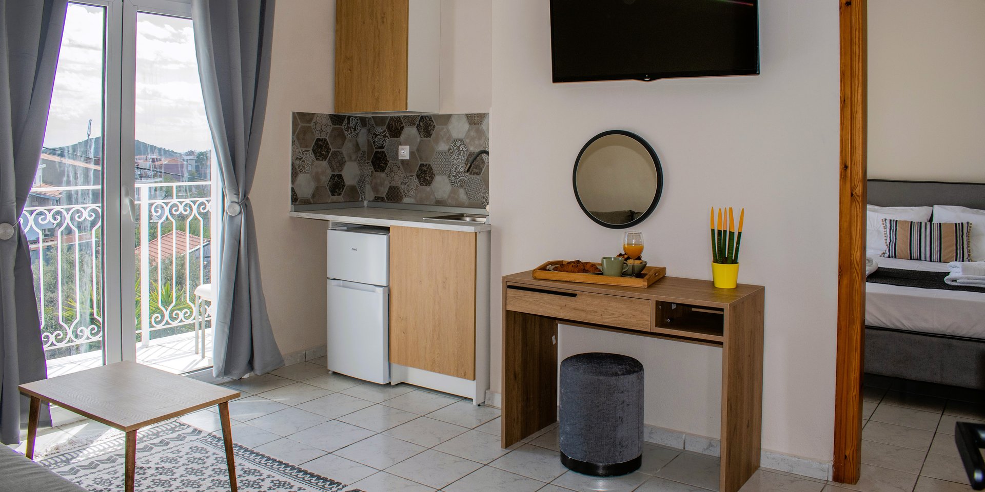 One Bedroom Apartment with kitchenette, Balcony, 2nd Floor.