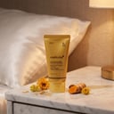 Medicube Kojic Acid Turmeric Night Wrapping Mask on marble nightstand
