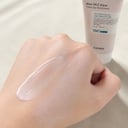 COSRX Aloe Tone-Up Sunscreen lightweight creamy texture swatched on skin