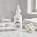 The Ordinary Hyaluronic Acid 2% + B5 Ceramides on white marble vanity