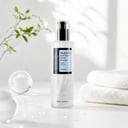 Cosrx Hyaluronic Acid Essence on vanity with hydrating routine