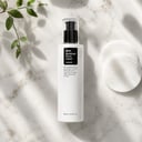 Cosrx BHA Power Liquid on surface with cotton pad