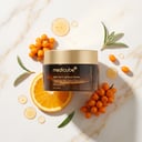 Medicube Vita C Cream with sea buckthorn berries and orange slices