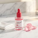 Medicube TXA Niacinamide 15 Serum on white marble vanity