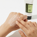 Applying COSRX Aloe Sun Cream on back of hand - lightweight no white cast