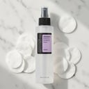 Cosrx AHA BHA Clarifying Toner with cotton pad on surface