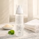 Dr.Althea 345 Relief Cream Mist on white marble vanity with fresh rice and leaves