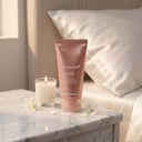 Medicube Collagen Overnight Wrapping Mask on marble nightstand