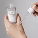 Skin1004 Centella Ampoule with Madewhite capsule beads on glass surface