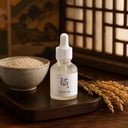 Beauty of Joseon Glow Deep Serum on wooden surface with rice and grain bowl