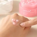 Medicube PDRN Pink Capsule Cream pink capsules and clear gel blended on hand