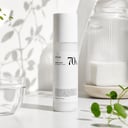 Anua Heartleaf 70 Daily Relief Lotion on vanity with daily routine