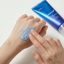 Applying Medicube Zero Pore Mud Mask on back of hand - clay texture