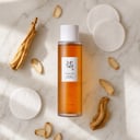 Beauty of Joseon Ginseng Essence Water on surface with ginseng root elements